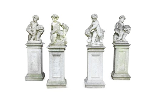 Lot 771 - A suite of four composition stone statues of putti, 20th century