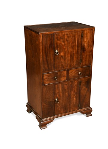 Lot 714 - A figured mahogany bedside cupboard, early 19th century