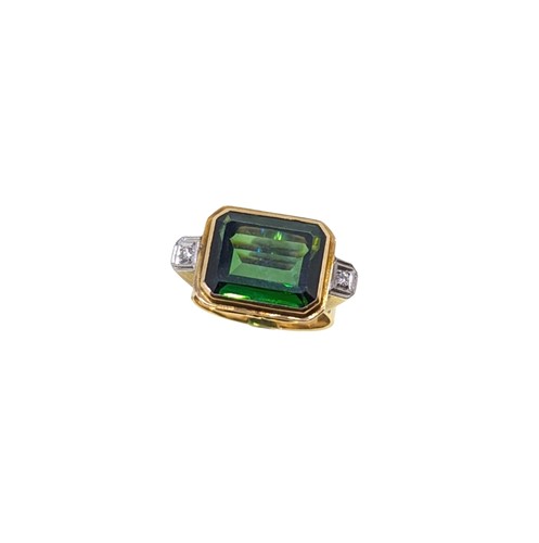 Lot 110 - A tourmaline and diamond dress ring