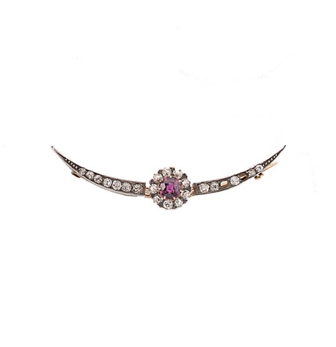 Lot 77 - A ruby and diamond crescent brooch