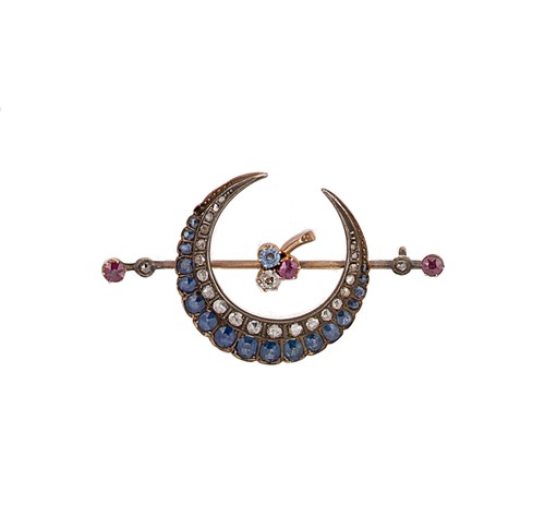 Lot 138 - A Victorian diamond, sapphire and ruby crescent brooch