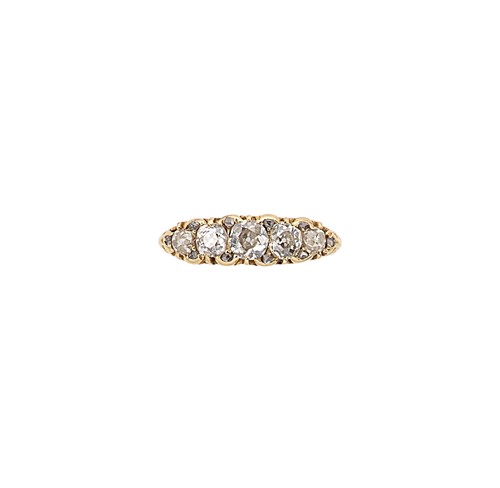 Lot 282 - A Victorian 18ct gold diamond set carved half hoop ring