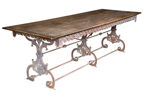 Lot 737 - A Victorian style cast iron table with an oak plank top