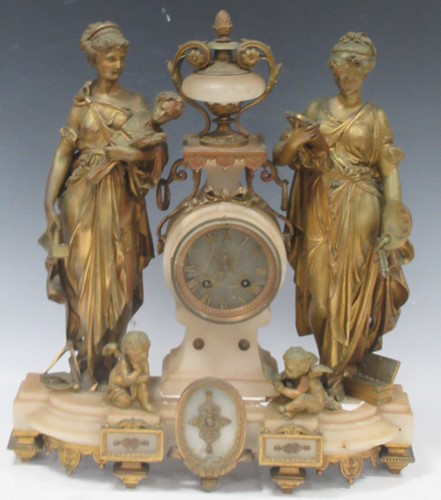 Lot 49 - A gilt figural mantle clock, 46cm high