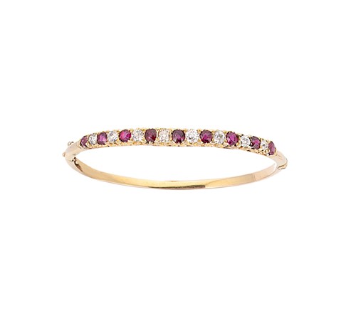 Lot 200 - A Victorian ruby and diamond hinged bangle