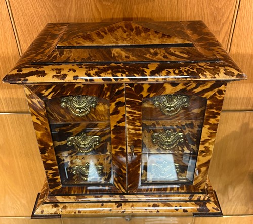 Lot 544 - A tortoiseshell table cabinet, 19th century
