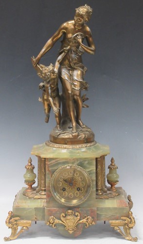Lot 204 - After Ferrand, a gilt metal mounted onyx...