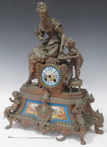 Lot 41 - A bronzed spelter and enamel figural mantle...