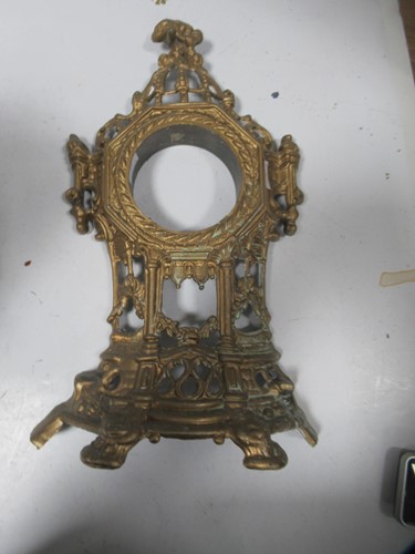 Lot 45 - A brass gothic style mantle clock 53 x 30 x...