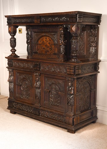 Lot 584 - An oak court cupboard in early 17th century style