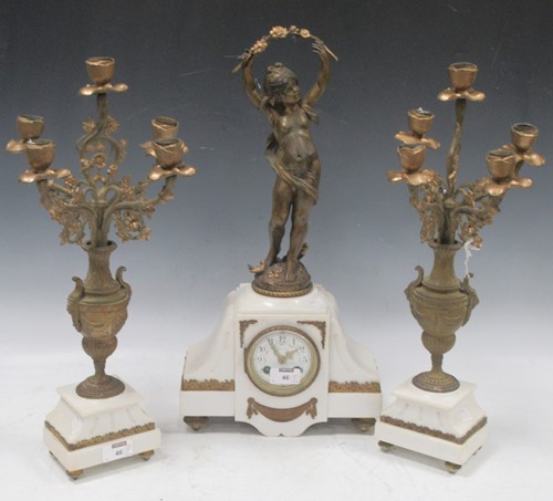 Lot 46 - A French clock garniture of three parts, the...