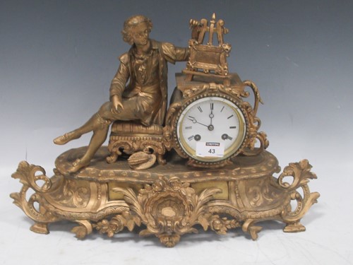 Lot 43 - A French gilt metal figural mantel clock circa...