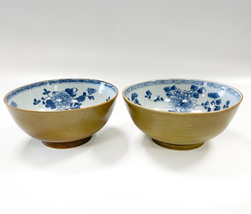 Lot 13 - Two Chinese Nanking Cargo blue and white and cafe-au-lait bowls, circa 1750