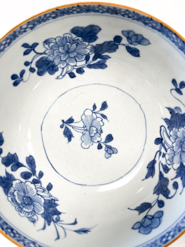 Lot 13 - Two Chinese Nanking Cargo blue and white and cafe-au-lait bowls, circa 1750