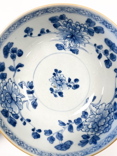 Lot 13 - Two Chinese Nanking Cargo blue and white and cafe-au-lait bowls, circa 1750