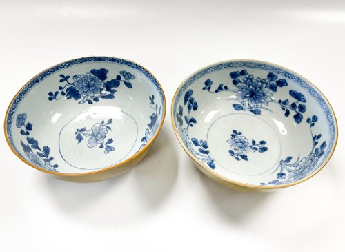 Lot 13 - Two Chinese Nanking Cargo blue and white and cafe-au-lait bowls, circa 1750