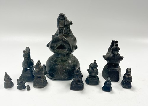 Lot 97 - A set of eleven Burmese bronze 'opium' weights, 19th century