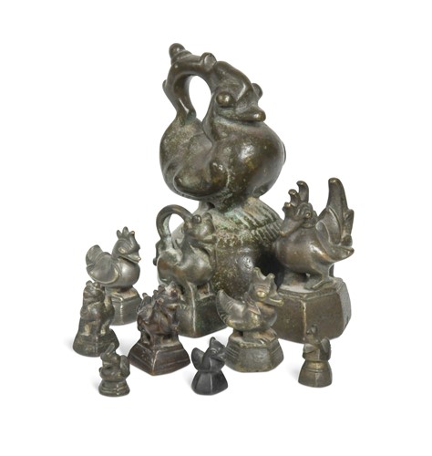 Lot 97 - A set of eleven Burmese bronze 'opium' weights, 19th century