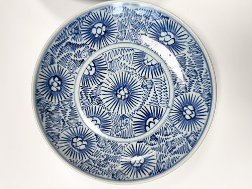 Lot 36 - Two similar Chinese Diana Cargo blue and white porcelain large starburst dishes, circa 1816