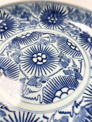 Lot 36 - Two similar Chinese Diana Cargo blue and white porcelain large starburst dishes, circa 1816