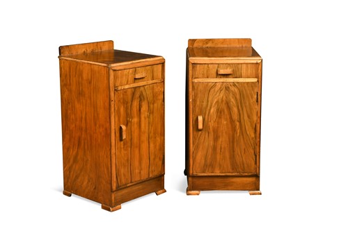 Lot 180 - A pair of Art Deco walnut bedside cupboards