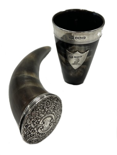 Lot 499 - A 19th century silver topped horn snuff mull together with a later silver topped horn beaker