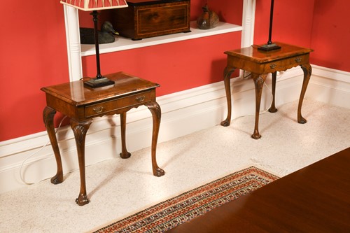 Lot 569 - A pair of walnut and banded side or lamp tables, 20th century