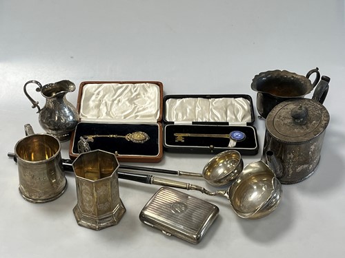Lot 380 - A collection of silverware including teapot,...