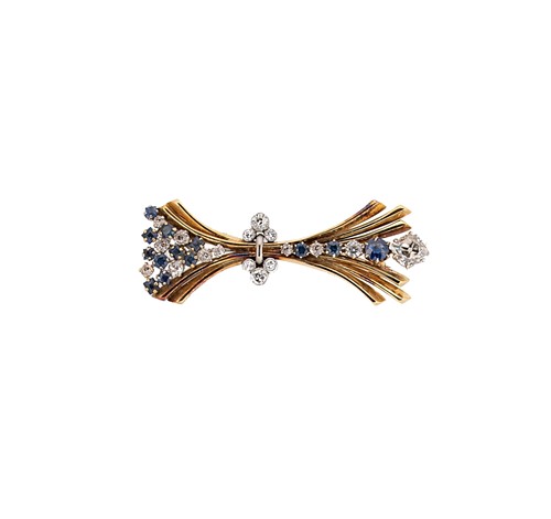 Lot 231 - An 18ct gold  diamond and sapphire brooch