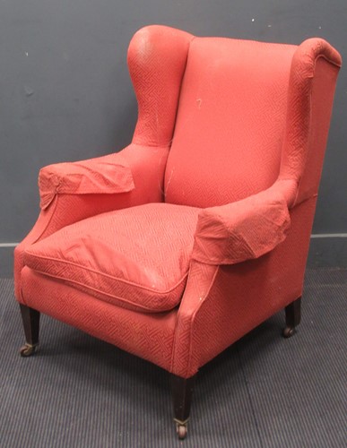 Lot 546 - An Edwardian wingback armchair 194 x 75 x 80cm