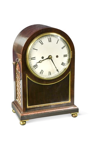 Lot 387 - A mahogany dome top mantle clock, 19th century