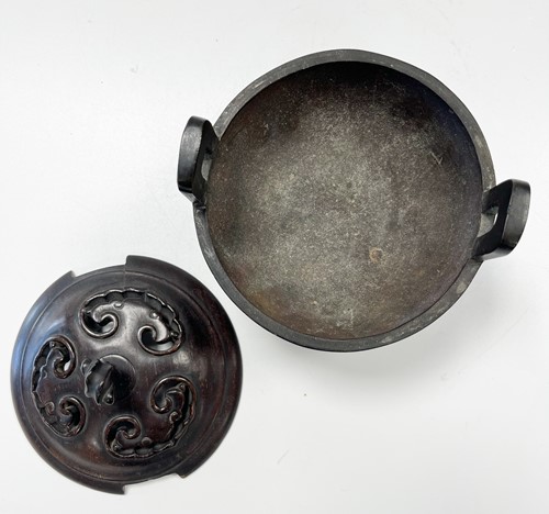 Lot 64 - A Chinese bronze tripod censer in archaic style, Qing Dynasty, 19th century