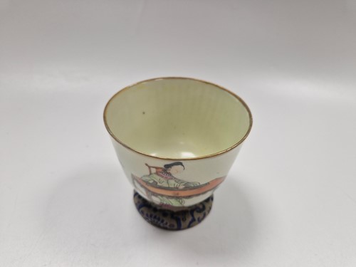 Lot 31 - A set of three Wu Shuang Pu famille rose bowls, late Qing Dynasty