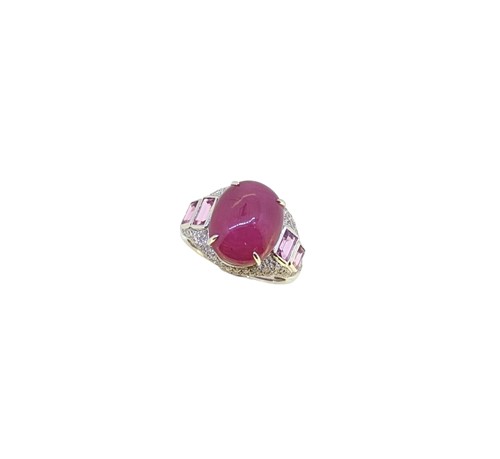 Lot 201 - A cabochon ruby and diamond dress ring