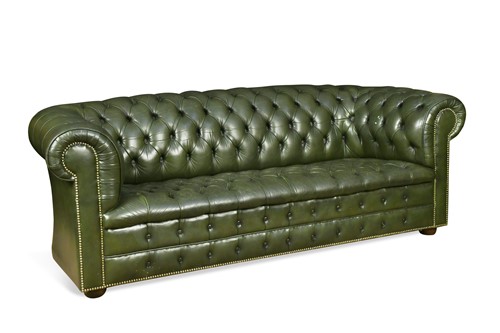 Lot 593 - A green leather buttoned chesterfield sofa, modern