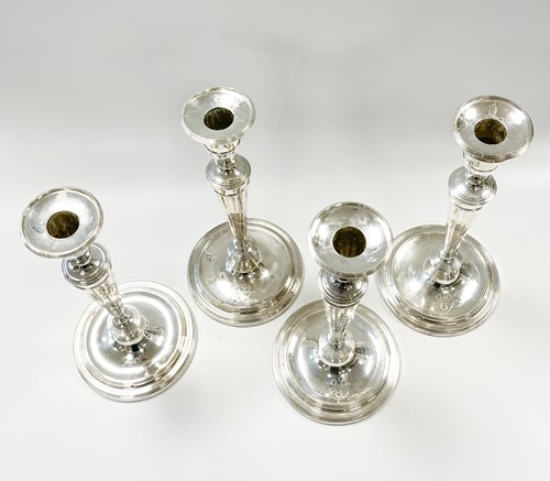 Lot 579 - A set of 4 George III 18th century silver candlesticks, mark of John Schofield