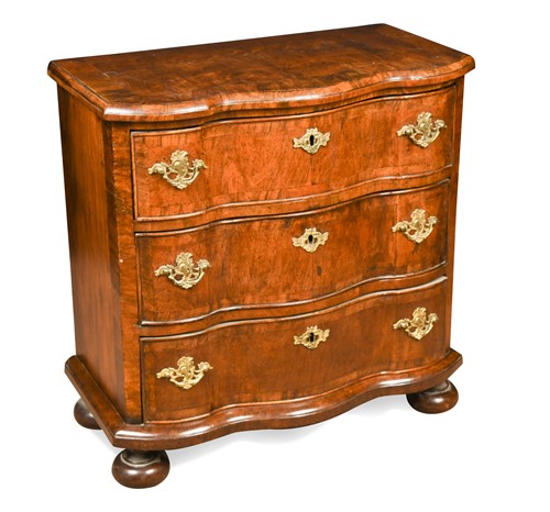 Lot 441 - A small walnut chest of three drawers, late 18th century