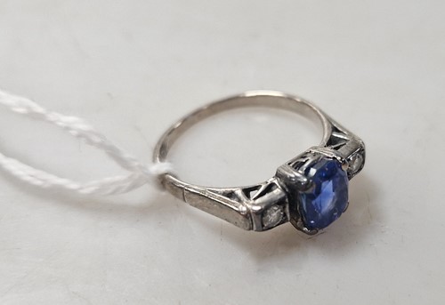 Lot 353 - A sapphire and diamond three stone ring,...