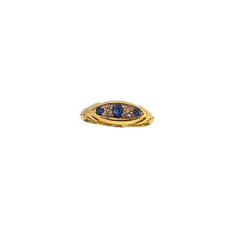 Lot 114 - An Edwardian hallmarked 18ct gold sapphire and diamond ring