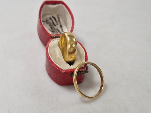 Lot 194 - Two hallmarked 22ct gold wedding bands, gross...