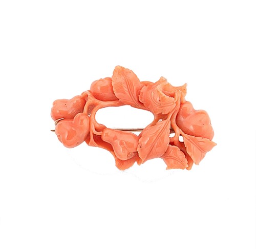 Lot 50 - A carved coral brooch