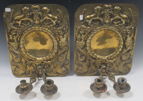 Lot 192 - A pair of 20th century embossed brass twin...