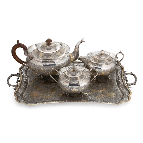 Lot 561 - A (probably) late 19th century Islamic parcel gilt 3-piece tea set with tray