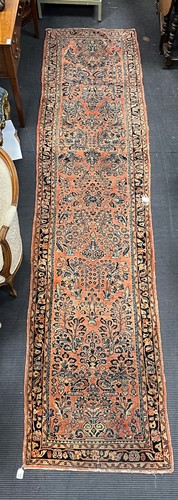 Lot 490 - A Kashan runner, circa 1900, with flower...