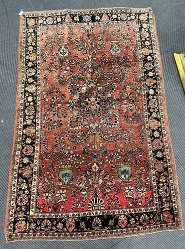 Lot 491 - A Kashan rug, circa 1900, with four turquoise...