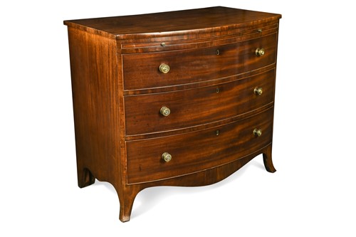 Lot 714 - A George III mahogany bow fronted chest, circa 1790
