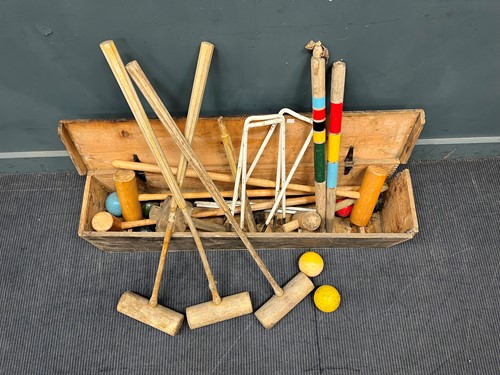 Lot 582 - A 20th century croquet set in a pine box,...