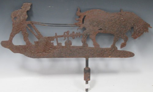 Lot 42 - A weather vane of farmer and horse ploughing....