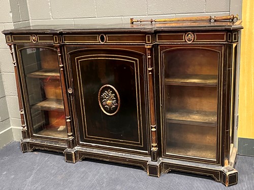 Lot 617 - A Victorian ebonised credenza display cabinet...