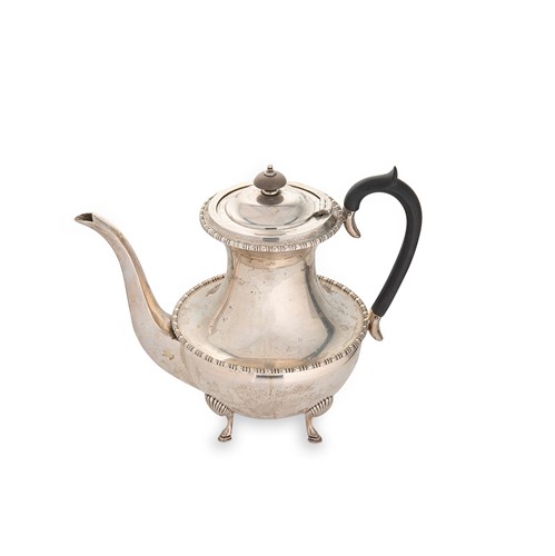 Lot 645 - A George V silver coffee pot